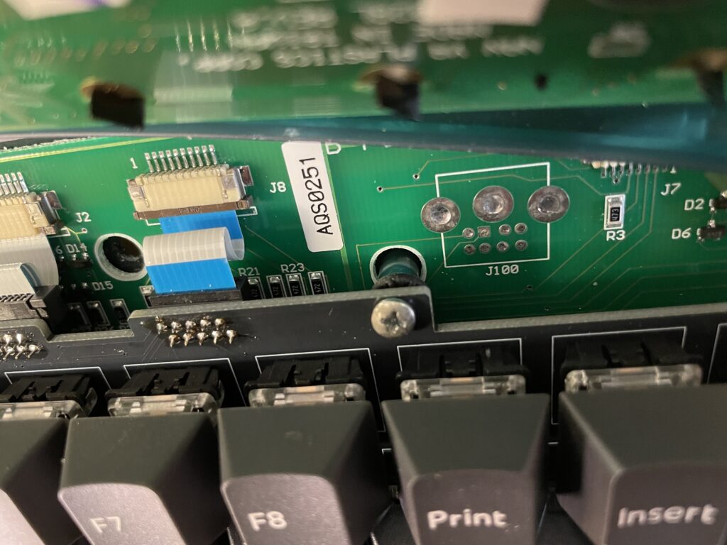 Washer under PCB.